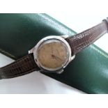 Longines; A Gent's Wristwatch, the signed dial with Roman numerals and dot markers, within Arabic