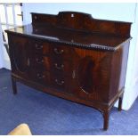 A mahogany sideboard, with shaped pedime