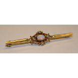 A 9ct gold opal and diamond bar brooch,