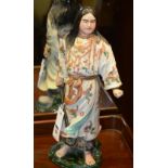 A Japanese porcelain figure of a warrior