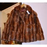 A vintage fur coat, of small form CONDITION REPORT: Lot 68 - approximate size 12/14 (small across