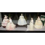 A group of five limited edition Coalport statuettes, 'Lily', 'Rose', 'Queen Victoria', 'Carnation' &