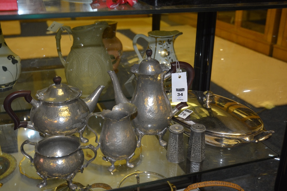 A Tudric pewter tea service, comprising teapot, coffee pot, cream and sugar, salt and pepper, - Image 2 of 2
