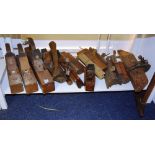 A quantity of woodworking planes and too