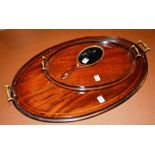 A mahogany oval serving tray, in the Geo