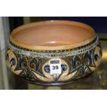 A Doulton glazed pottery bowl by Edith L