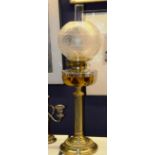 A Victorian brass oil lamp, with glass s