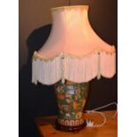An Oriental ceramic table lamp with shad