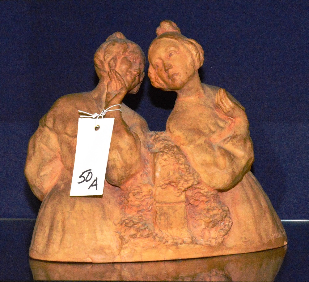 A terracotta figure group, depicting two