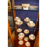 A Nautilus porcelain tea set, comprising two biscuit plates, sugar bowl, six side plates, 11 saucers