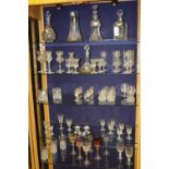 A suite of etched thistle decorated glassware to include decanter with spirit label, vase and approx