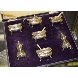 A silver seven piece condiment set, the