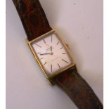 A ladies Omega De Ville Automatic watch, the square silvered dial with baton numerals within