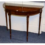A mahogany demi-lune hall table, raised