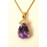 A 14ct  gold amethyst and diamond pendan