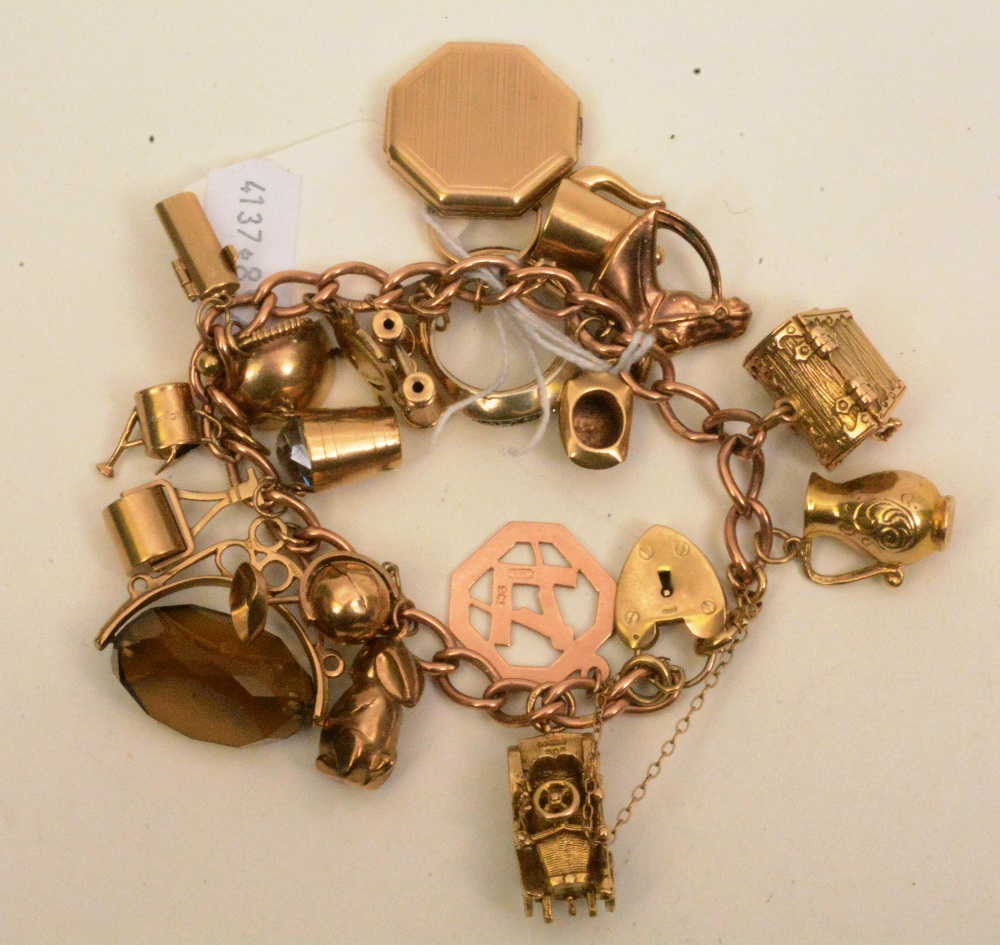 A 9ct gold charm bracelet, 21cm diameter