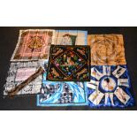 A collection of six silk scarves, includ