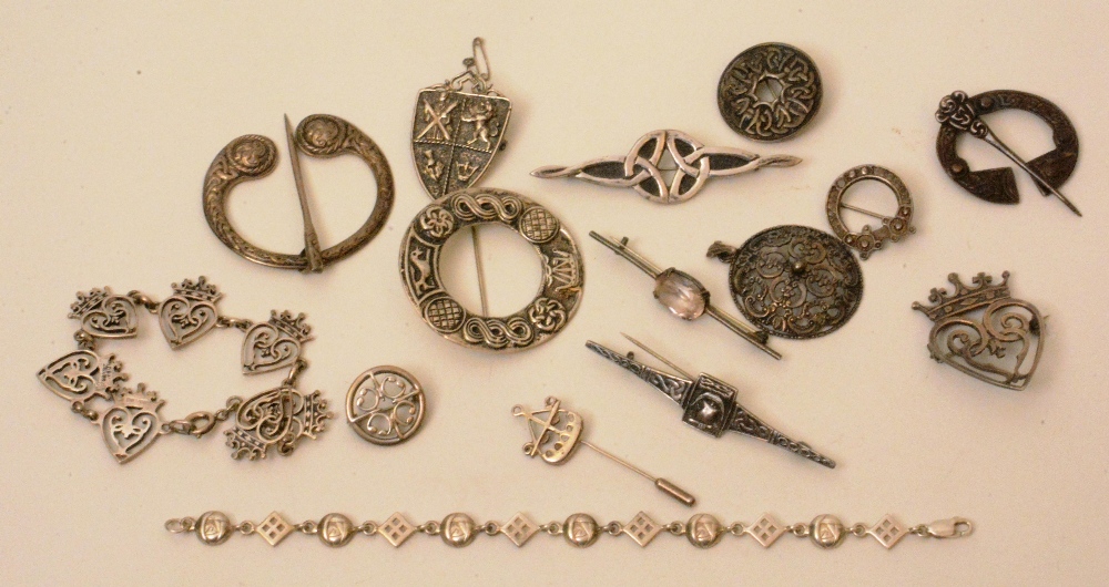 A quantity of silver jewellery, to include Celtic brooches, pendants and bracelets, three by John