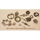 A quantity of silver jewellery, to include Celtic brooches, pendants and bracelets, three by John