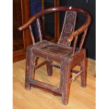 A Chinese hardwood armchair, of horsesho