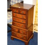 A small walnut tallboy chest, with two s