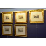 A set of five framed etchings, including