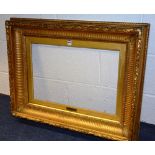 A Victorian gilt gesso picture frame, la