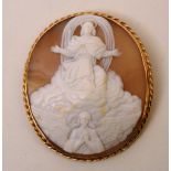 A large yellow metal cameo, depicting the Lord and angel within the heavens, 6 x 5cm CONDITION