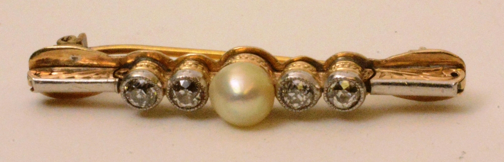 A yellow metal diamond and pearl bar bro