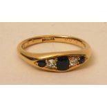 An 18ct gold sapphire and diamond five s