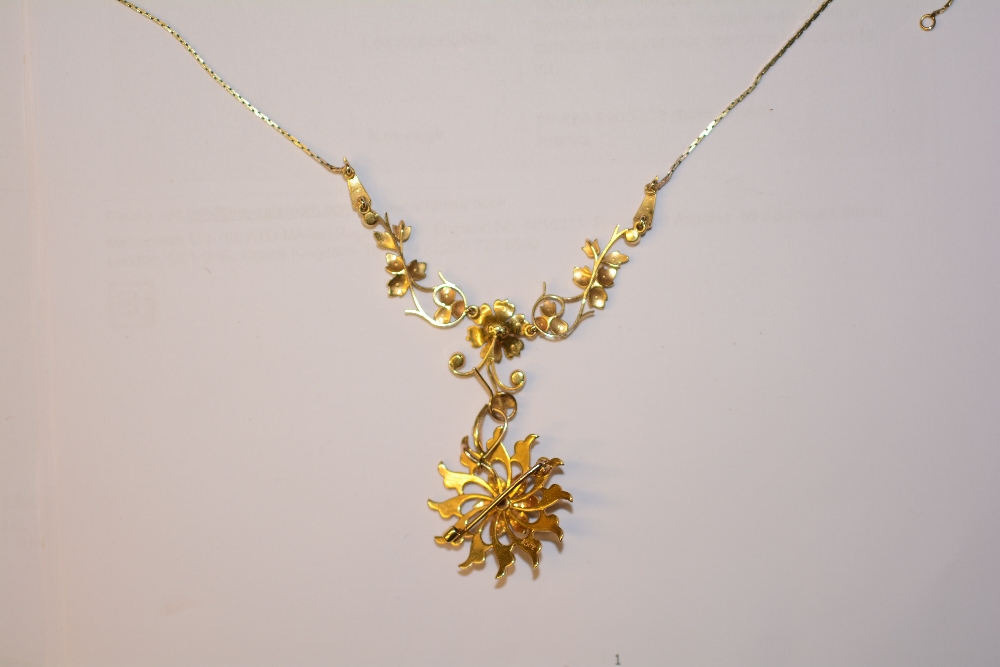 A late Victorian 15ct gold and seed pearl pendant, the central flowerhead drop and foliate detail - Image 3 of 5