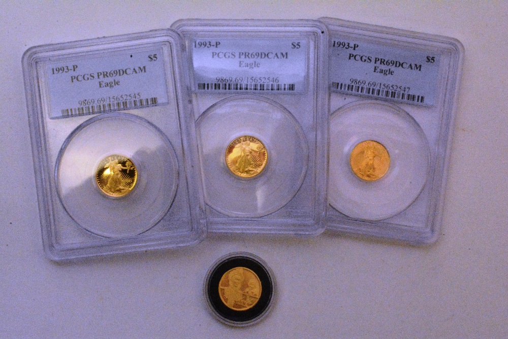 Three United States of America gold five