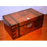 A Victorian walnut and brass bound lap desk, with hinged lid enclosing leather tooled interior,