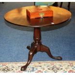 A George III mahogany supper table, with circular snap top,