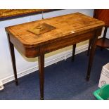 A George IV mahogany tea table, with fold over top above frieze,