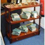 A Victorian mahogany whatnot, with three open tiers on turned columns above long drawer, 90.