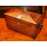 A Regency rosewood tea caddy, of sarcophagus shape,