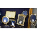 Six small silver photo frames (6)