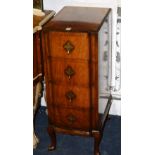 A walnut pedestal chest of drawers, with four graduated drawers, raised on short supports,