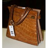 A vintage crocodile skin handbag, with strap carry handles, 23.