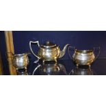 A late George III silver three piece teaset, London 1809 by Thomas Wallis & Jonathan Hayne,