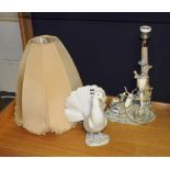 A Lladro figure of a dove, 21cm high, together with a Lladro table lamp in the form of a girl with