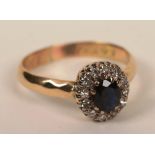 A sapphire and diamond cluster ring,