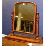 A Victorian mahogany dressing mirror with swing plate glass mirror,