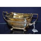 A late George III silver sugar bowl, London 1789 by D?, with moulded and scalloped shell rim,