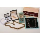 A collection of costume jewellery, to include a silver and marcasite necklace and earring set,