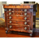 A 19th century apprentice scotch mahogany chest, with six small drawers above three long drawers,