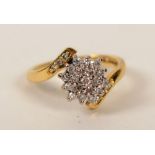 WITHDRAWN An 18ct gold diamond cluster ring, with 19 round cut diamonds to cluster,