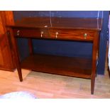 A mahogany serving table, with two short drawers above undertier, raised on tapering supports,