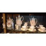 A Royal Albert Old Country Roses tea for two, with coffee pot, cream and sugar, and four egg cups,